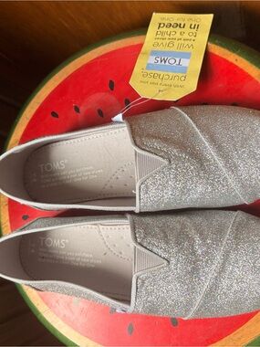 TOMS Women’s Glitter Slip-On Flats in Silver